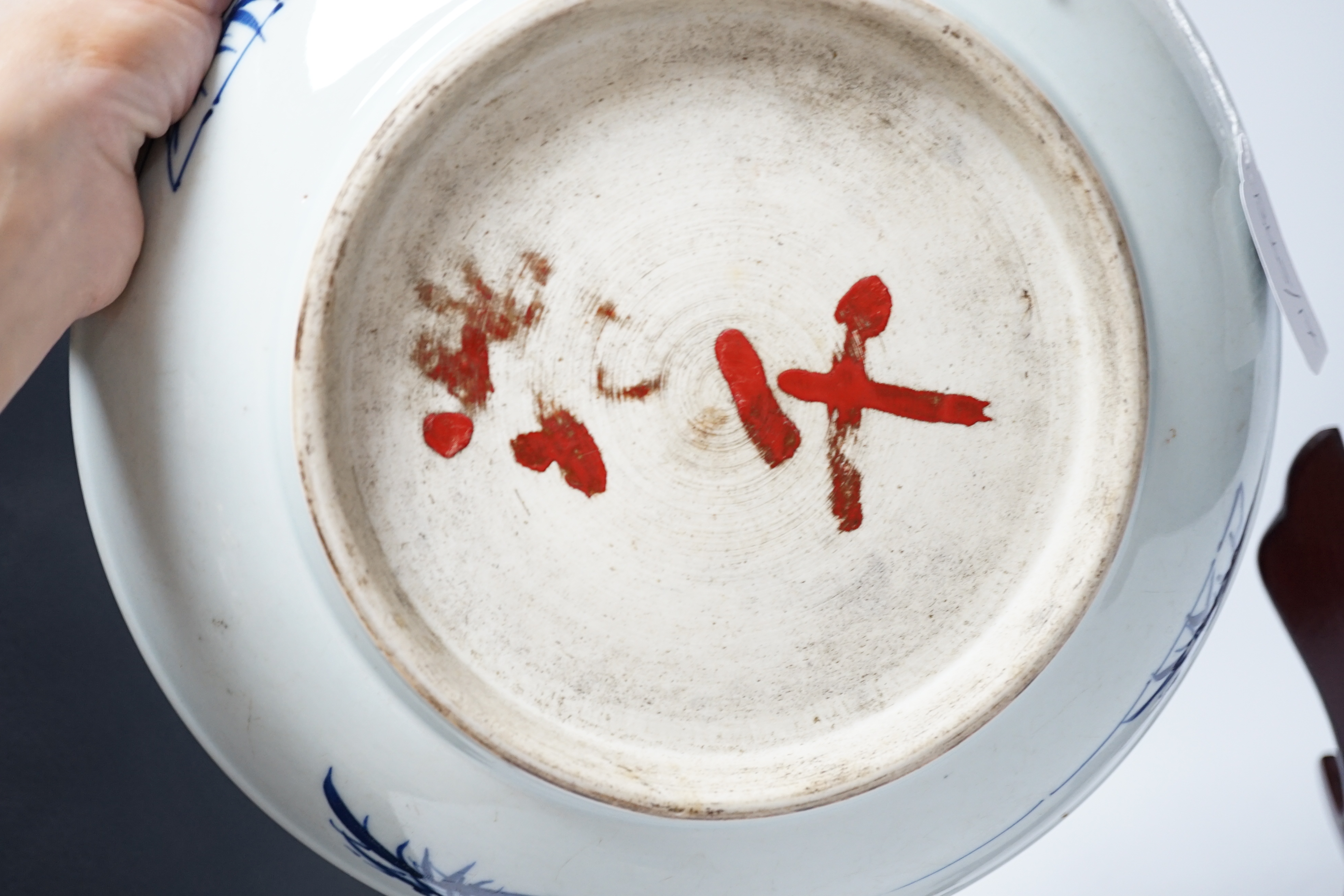 A large Chinese blue and white ‘mythical beasts’ saucer dish, Yongzheng period